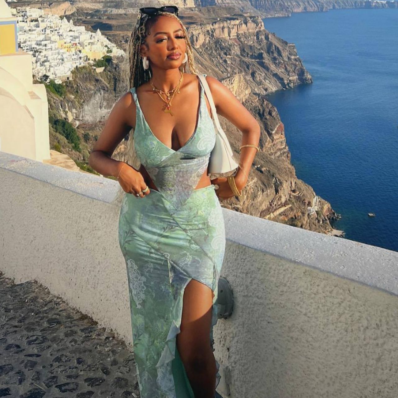 Fashionable printed irregular tops, sexy small vest, backless lace-up slit hip skirt suit