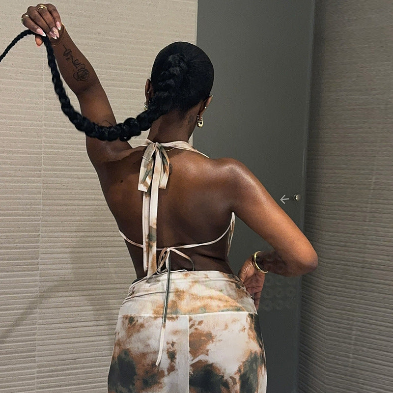Casual and fashionable women's printed pleated backless skirt suit Sleeveless lace-up deep V-neck long skirt two-piece suit