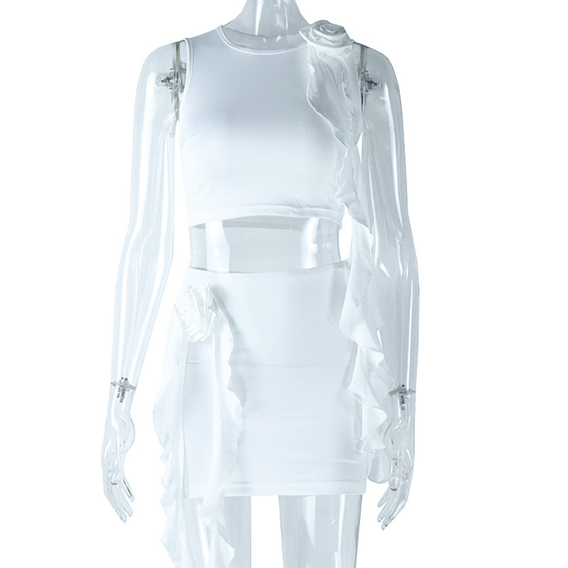 Tight solid color fashion suit hand-made flower round neck solid color navel-baring top mini skirt two-piece suit