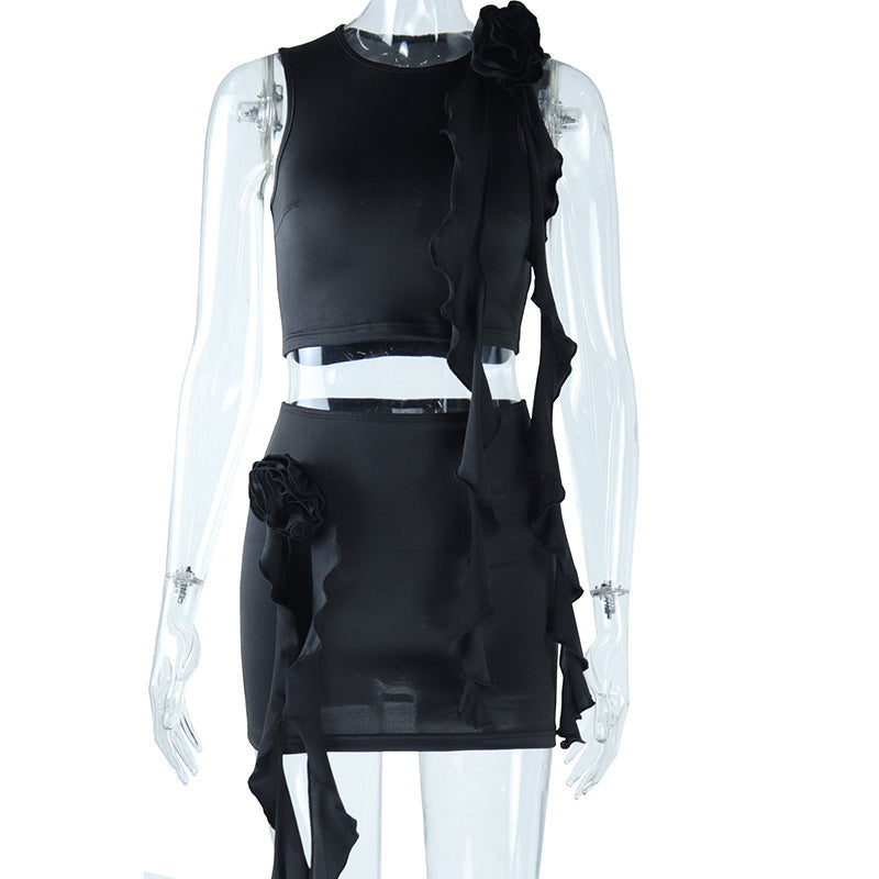Tight solid color fashion suit hand-made flower round neck solid color navel-baring top mini skirt two-piece suit