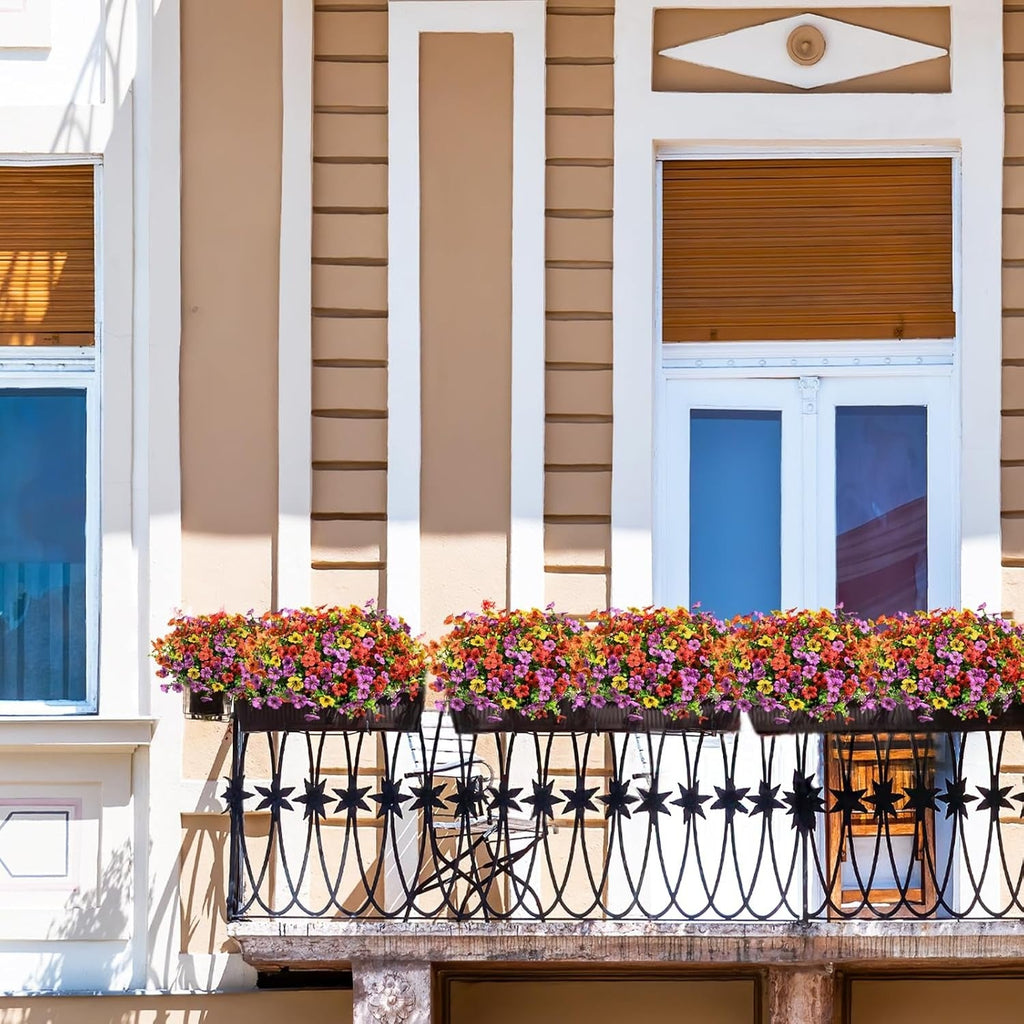 Balcony with flower boxes and a building facade in the background