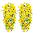 Two yellow floral arrangements on a white background