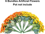 Bundles of artificial flowers with orange, yellow, and green colors on a white background.