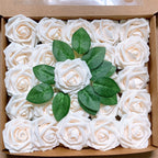 Box of white foam roses with green leaves