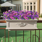 Decorative planter with purple and pink flowers on a balcony