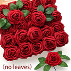 Bouquet of red roses with green leaves on a white background