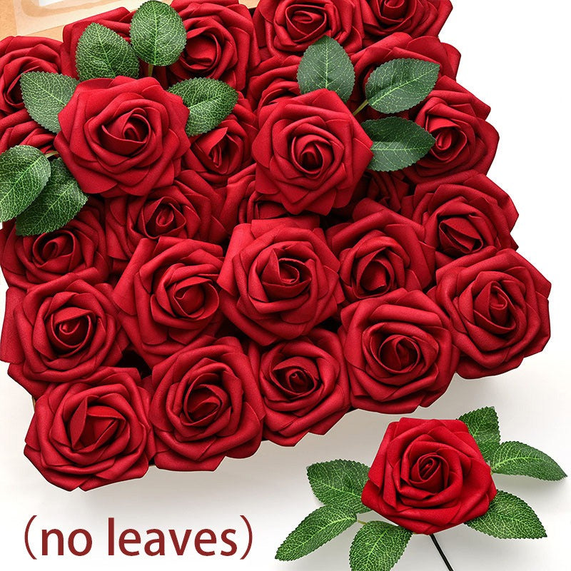 Bouquet of red roses with green leaves on a white background
