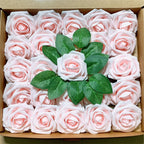Box of pink artificial roses with green leaves