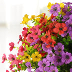 Bouquet of colorful flowers including red, yellow, and purple.