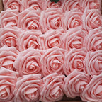Close-up of pink artificial roses arranged in a pattern