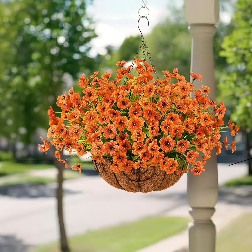Hanging basket of orange flowers with a blurred background