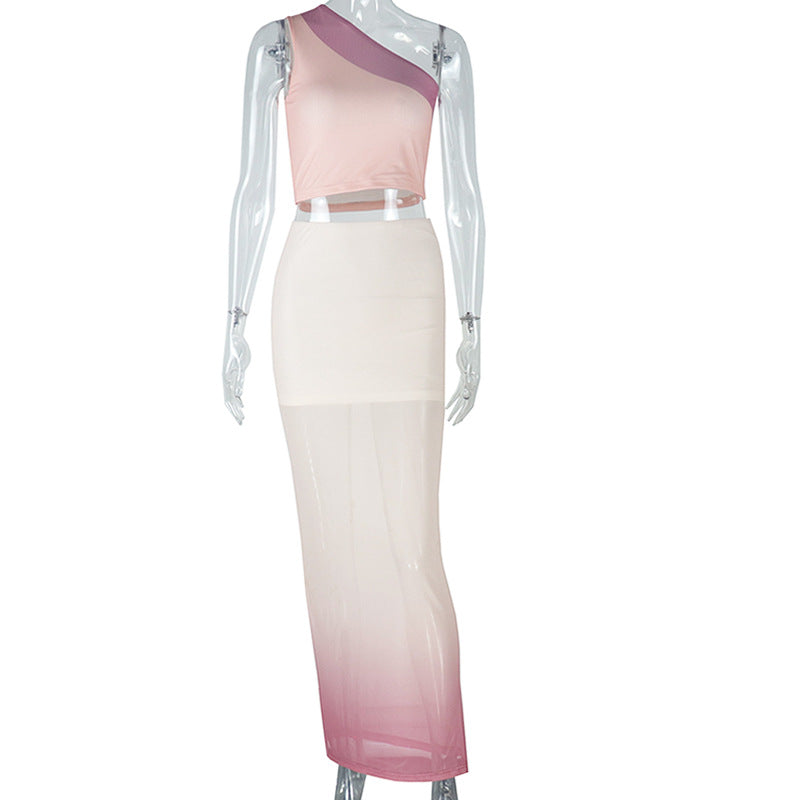 Fresh and fashionable women's clothing with exposed navel and hip-wrapped tight gradient skirt suit with oblique collar and slightly transparent long skirt two-piece suit