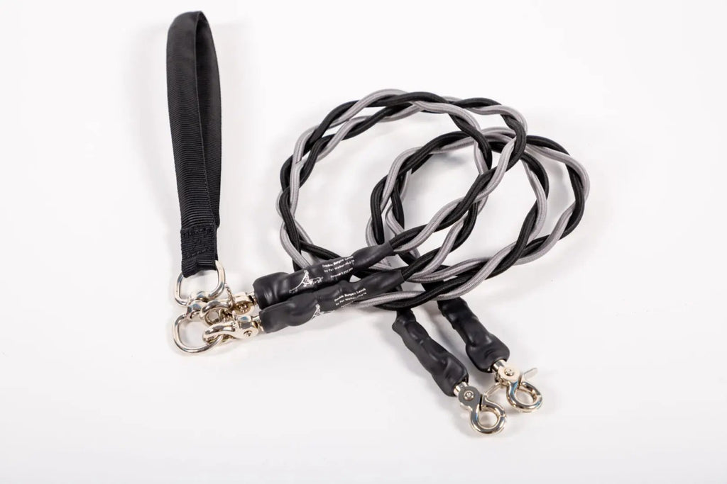 Black and gray braided lanyard with metal clasps on a white background