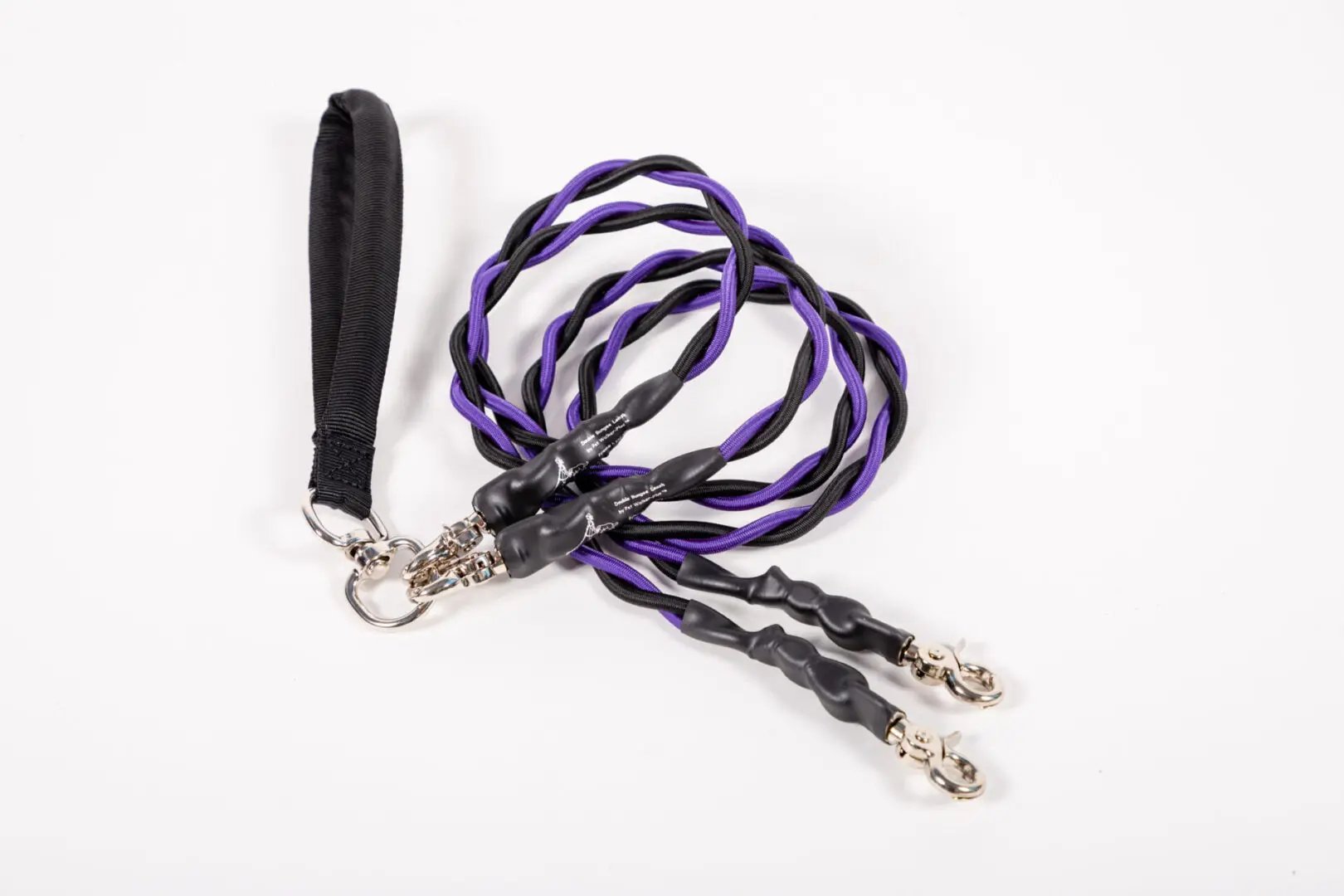 Black and purple braided lanyard with metal clasps on a white background