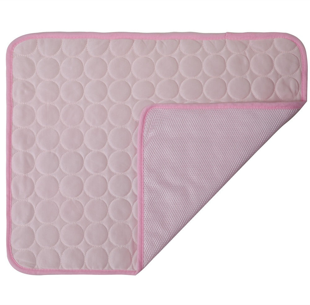 Pink quilted mat with a textured pattern on a white background